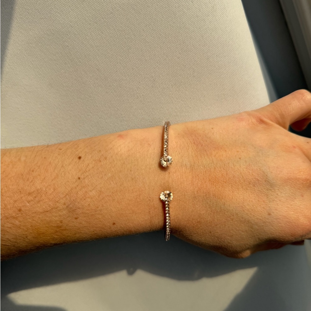 Givenchy rose gold tone pavé crystal open cuff bracelet with rhinestone ends